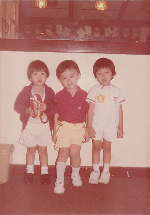 Three children posing in 1980s Hong Kong restaurant – family memory animation